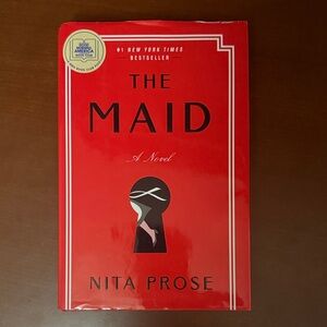 The Maid Novel by Nita Prose - Red Cover